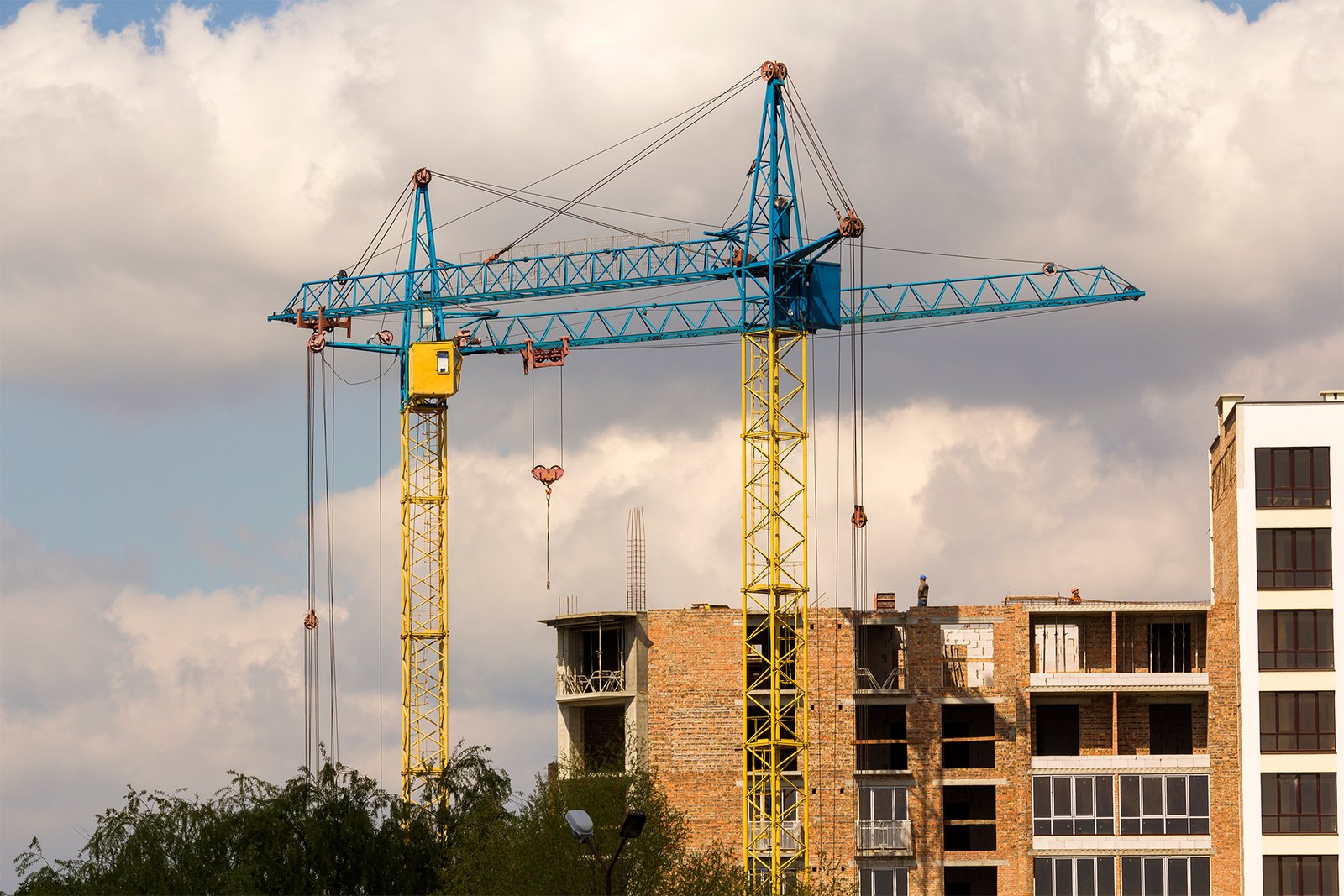 urban-view-of-silhouettes-of-two-high-industrial-t